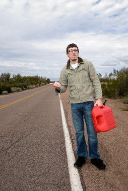 Stranded on road without gasoline clipart