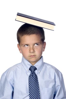 Boy balancing book on head clipart