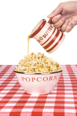 Hot popcorn with butter clipart