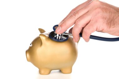 Piggy bank examined with stethoscope clipart