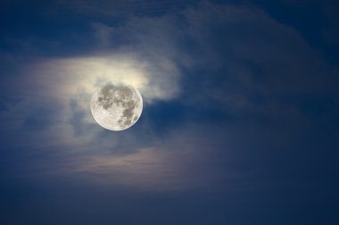 Full moon and cloudy sky clipart
