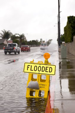 Flooded street and sign clipart