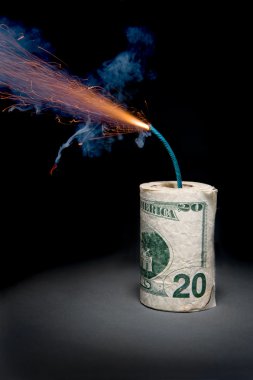 Dynamite cash with lit fuse clipart