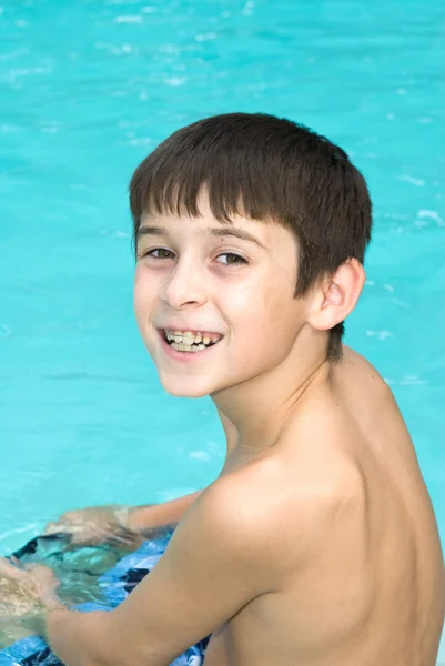 Boy at swimming pool — Stock Photo, Image
