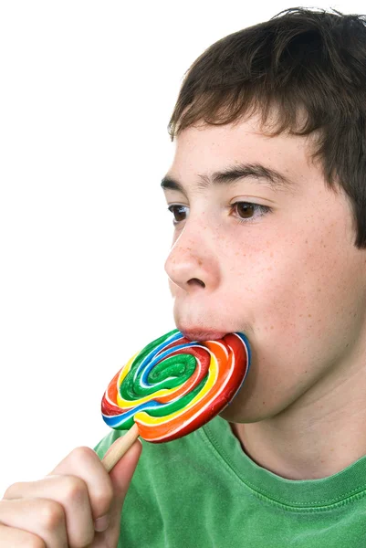 Pojke och godis-sucker — Stockfoto