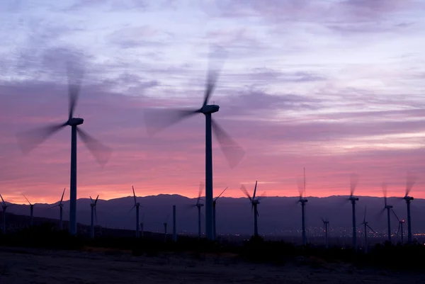 stock image Wind power mills at sunrise