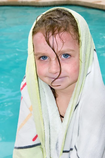 Little girl warming up after swimming — Stock Photo, Image
