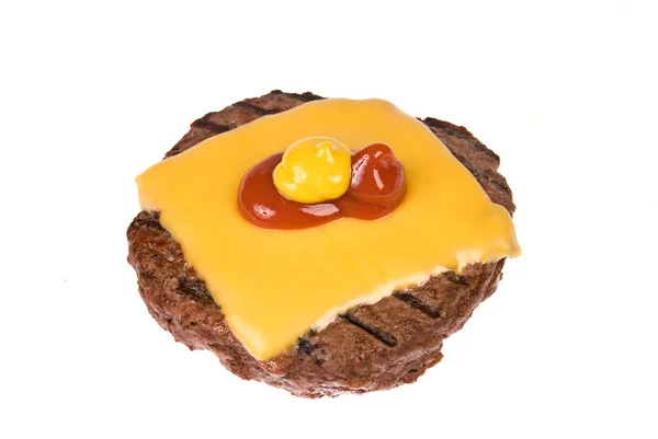 Hamburger pogácsa, sajt, mustár és ketchup — Stock Fotó