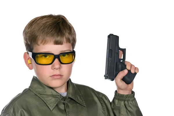 Chlapec s pistolí — Stock fotografie