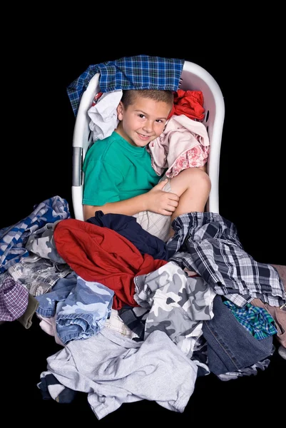 Boy in clothes basket — Stock Photo, Image
