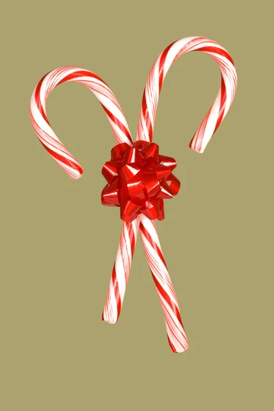 Candy canes and bow — Stock Photo, Image