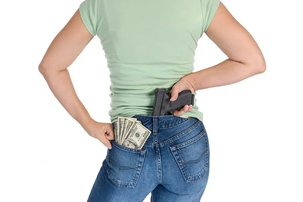 Γυναίκα με όπλο και μετρητά — Φωτογραφία Αρχείου