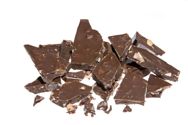 Trozos de chocolate aislados en blanco — Foto de Stock