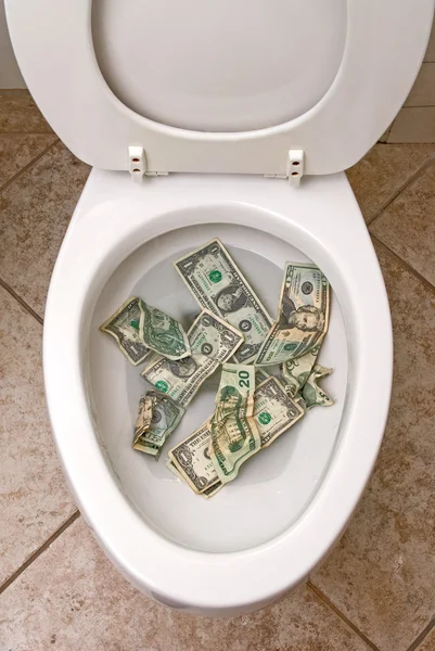 Toilet and money — Stock Photo, Image