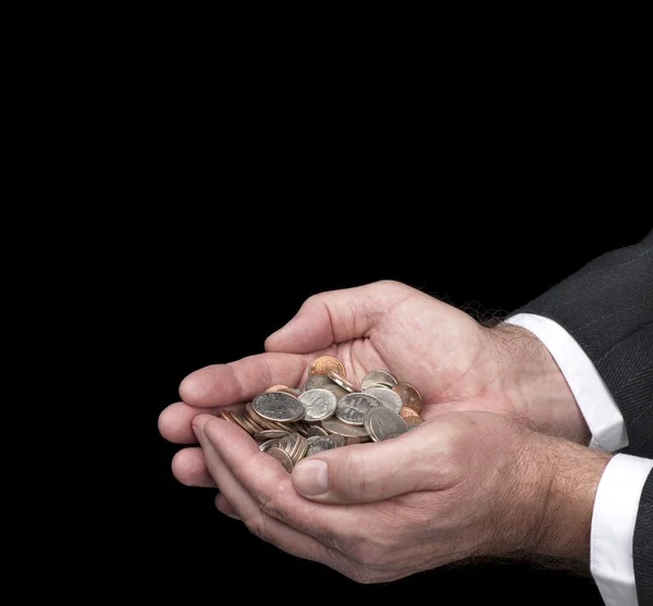 Man holding coins — Stock Photo, Image