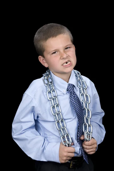 Chlapec s suite a řetěz kolem ramen — Stock fotografie