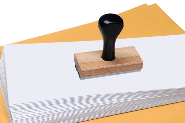 Envelopes and rubber stamp — Stock Photo, Image