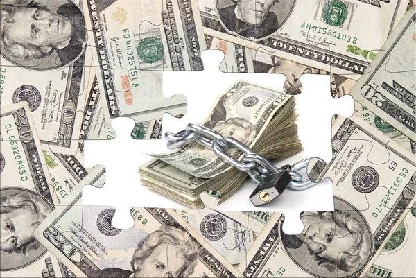 Geld puzzel met geketende contant geld — Stockfoto