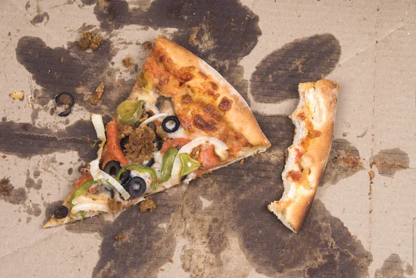 Pizza-Essensreste — Stockfoto