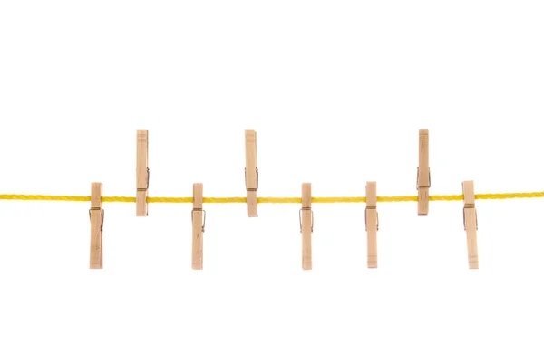 Clothesline and clothespins Isolated on white — Stock Photo, Image