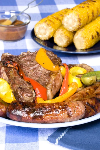 Bratwurst and steak picnic and dinner — Stock Photo, Image