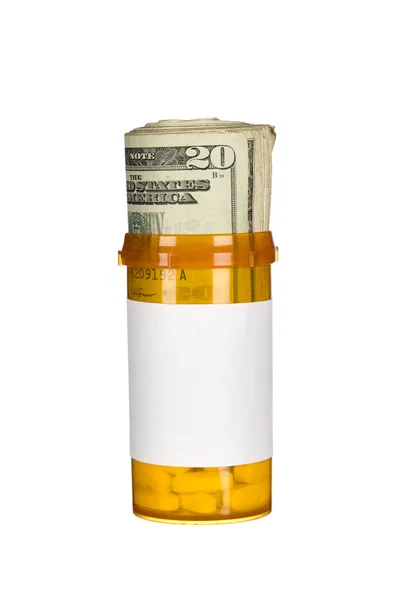 Pill bottle and cash — Stock Photo, Image