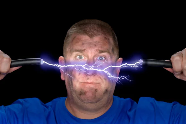 Man och elektrisk ljusbåge — Stockfoto