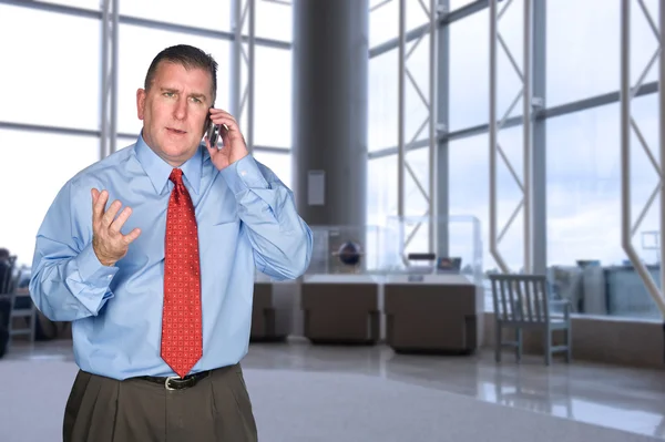 Businessman arguing on phone — Stock Photo, Image