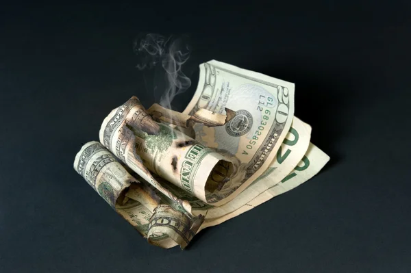 Smoldering currency — Stock Photo, Image