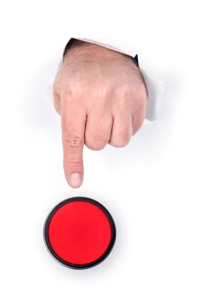 Palcem naciskając przycisk stop — Zdjęcie stockowe