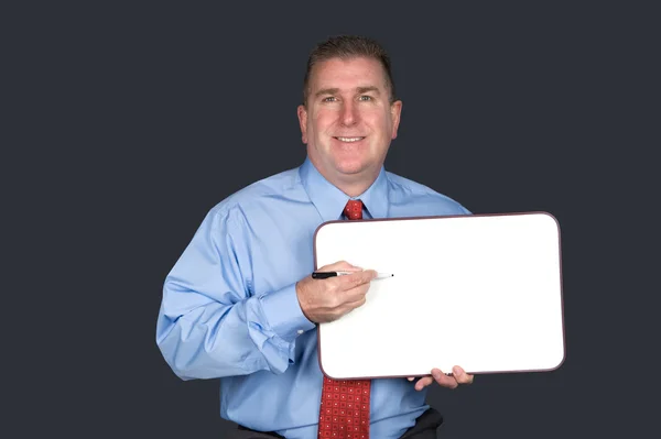 Geschäftsmann mit leerem Whiteboard — Stockfoto