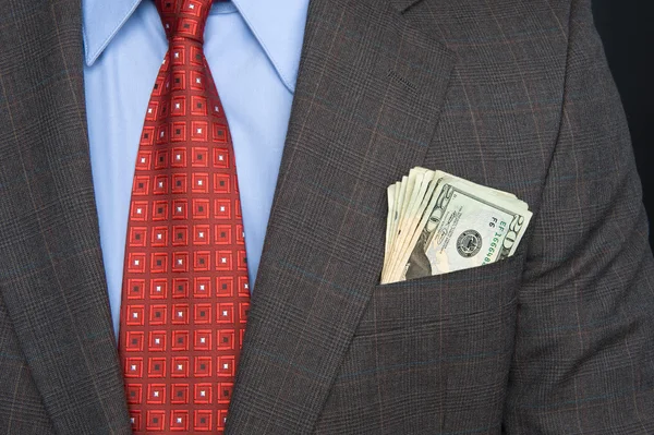 Cash in suit pocket — Stock Photo, Image