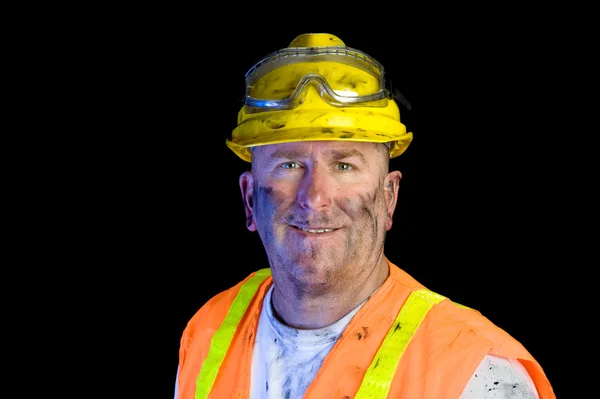 Smutsiga byggnadsarbetare bära hjälm — Stockfoto
