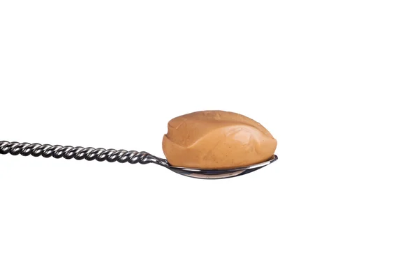 Spoonful of creamy peanut butter — Stock Photo, Image
