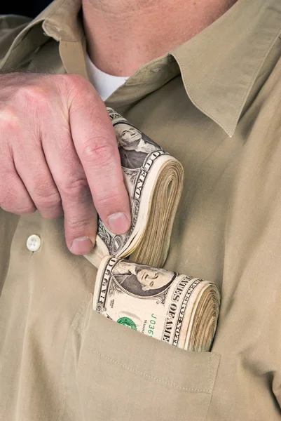 Putting cash in pocket — Stock Photo, Image