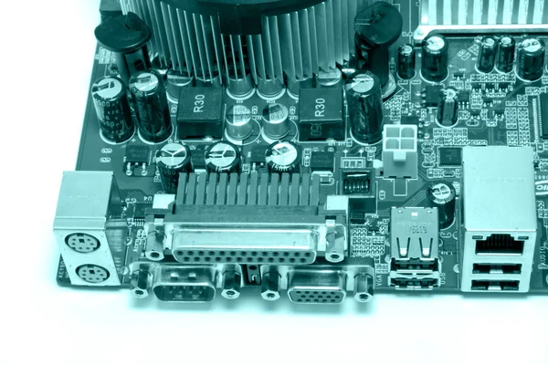 Colored blue photo of PC motherboard — Stock Photo, Image