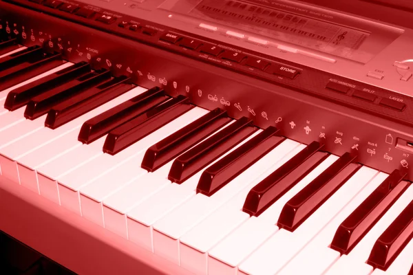 Colored sepia photo of electronic piano — Stock Photo, Image