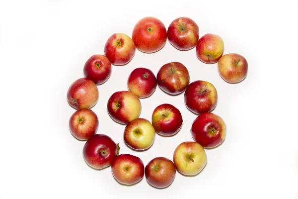 Spiral form of red apples isolated on white — Stock Photo, Image