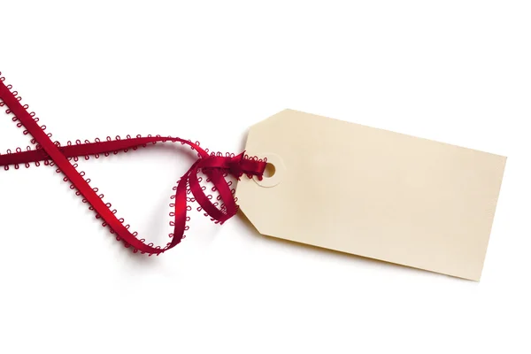 Gift Tag with Fancy Red Ribbon — Stock Photo, Image