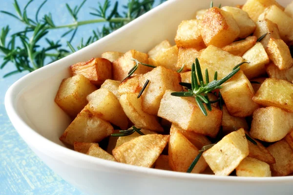 Patatas con romero —  Fotos de Stock