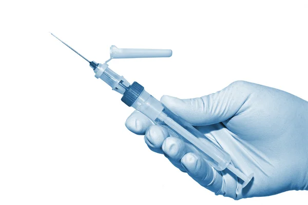 Hand and syringe isolated on white background — Stock Photo, Image