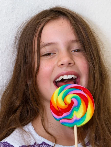 stock image Little girl with colorful lollipop