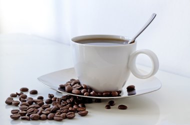 Coffee cup and coffee beans clipart