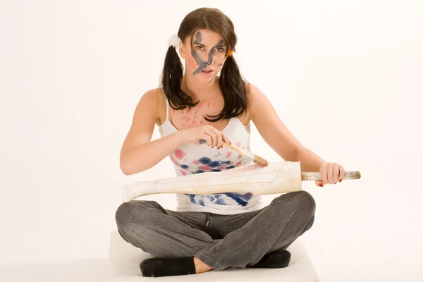 Young woman with paint on his face — Stock Photo, Image