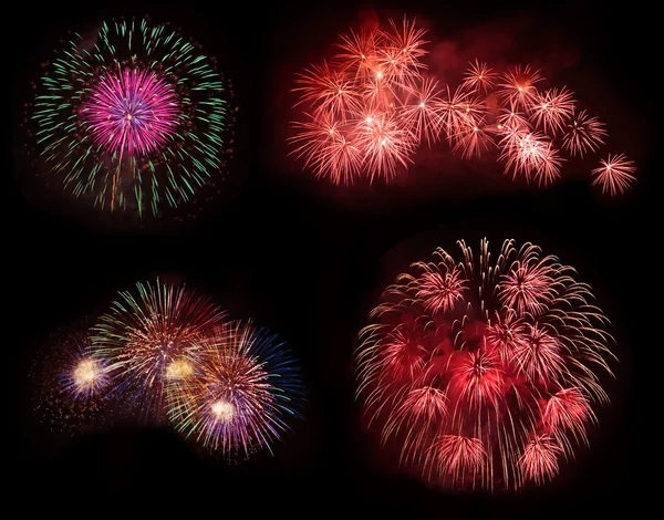 Multiple colorful fireworks isolated on black background — Stock Photo, Image