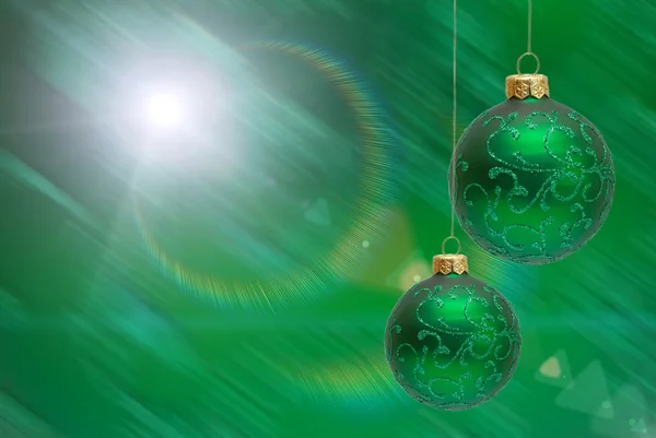 Різдвяні кульки на зеленому фоні — стокове фото