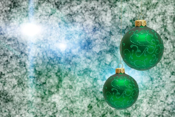 Bola de Natal no fundo iluminar — Fotografia de Stock