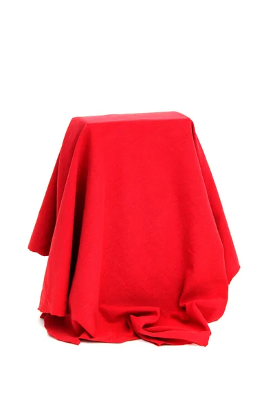 Mysterious box coverd with red cloth — Stock Photo, Image