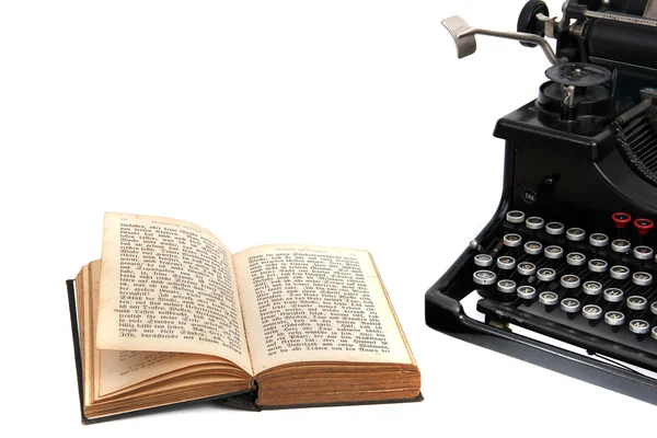 Schreibmaschine mit altem Buch — Stockfoto