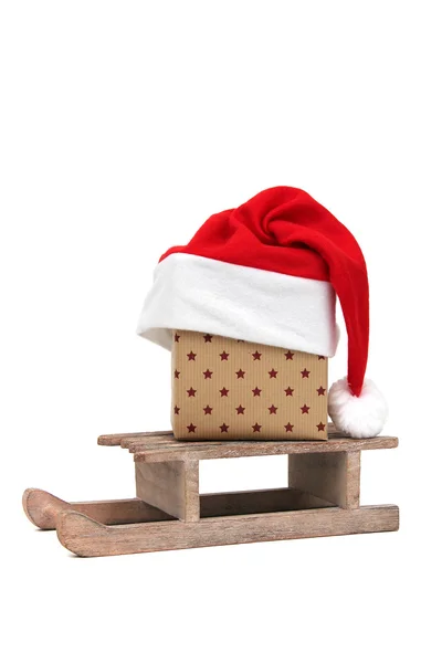 Christmas gift on sledge — Stock Photo, Image